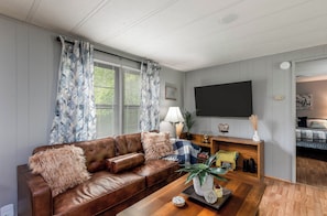 Living area - Private Wooded Retreat: 2BR Pet-Friendly Home Minutes from Downtown Troutman (Statesville)
