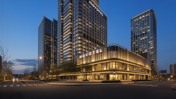 A modern hotel with a prominent 'NOVOTEL' sign, surrounded by high-rise buildings. - Novotel Chengdu Lige (Chengdu)
