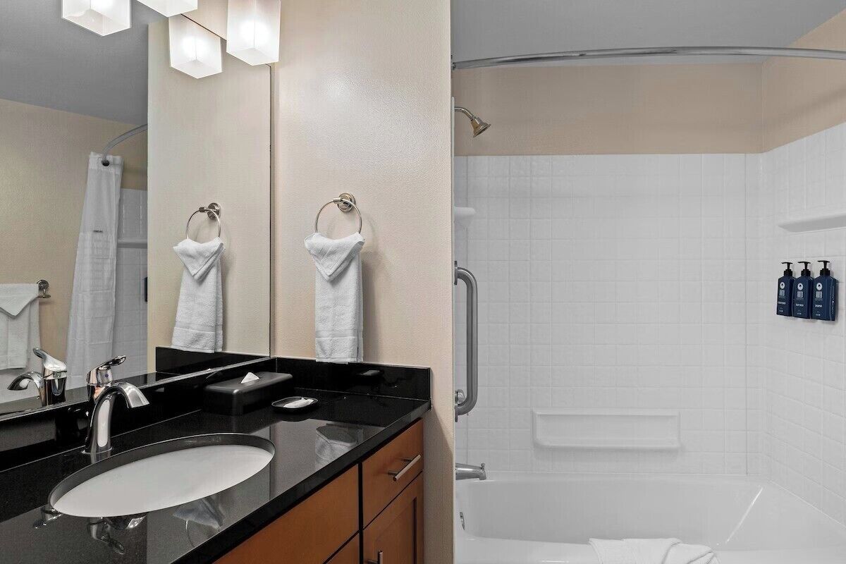 Hair dryer, towels, soap, shampoo
