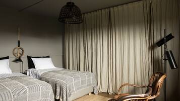 Blackout drapes, iron/ironing board, travel crib, free WiFi