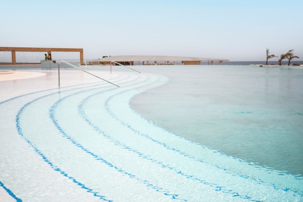 4 outdoor pools, open 8:00 AM to 6:30 PM, pool umbrellas, sun loungers
