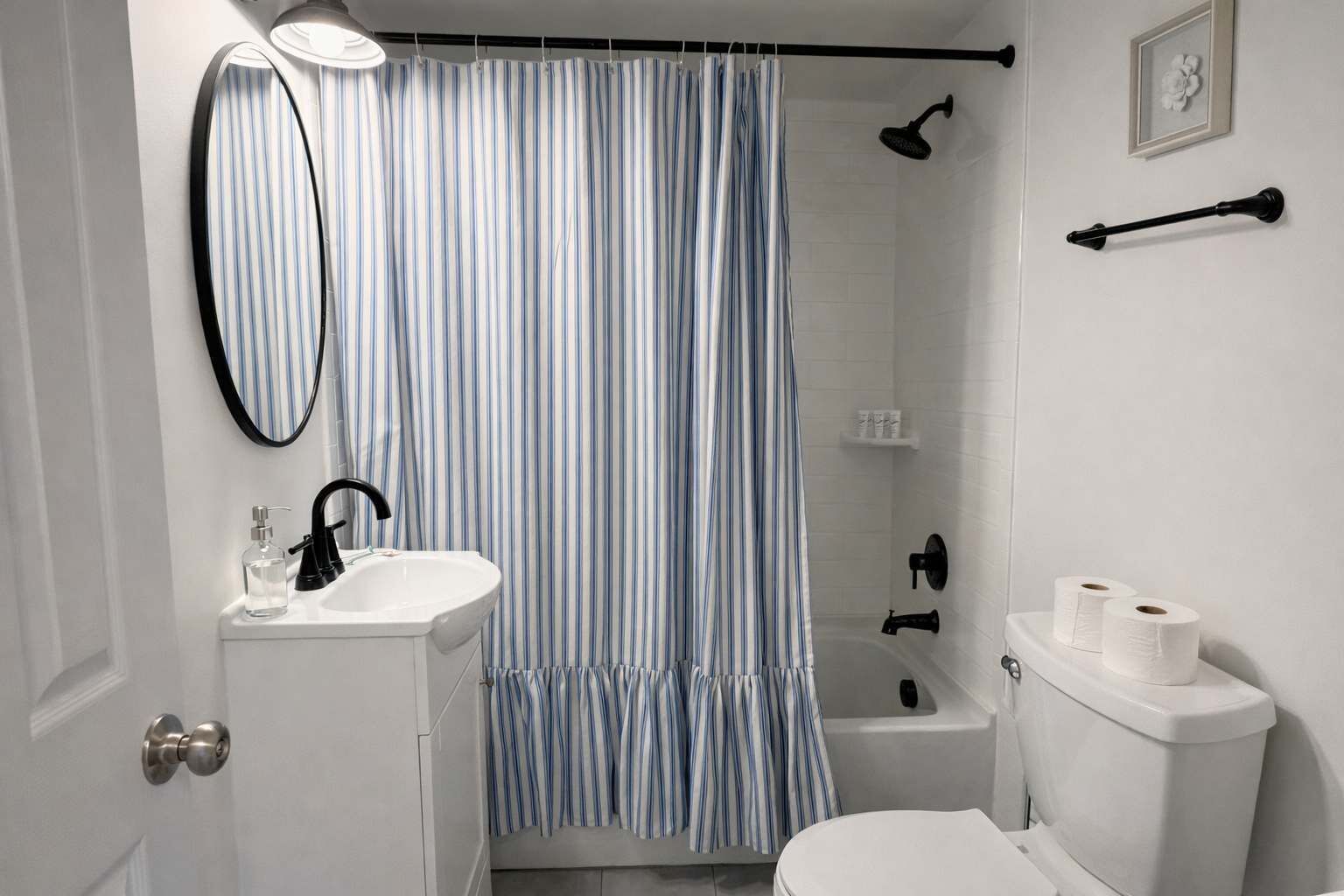 Shower, hair dryer, towels, shampoo