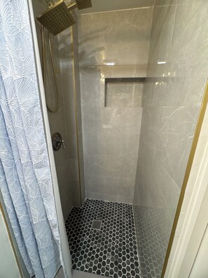 Hair dryer, towels, soap, shampoo