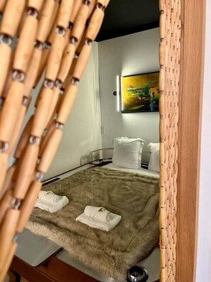 1 chambre, fer et planche à repasser, Wi-Fi gratuit, draps fournis