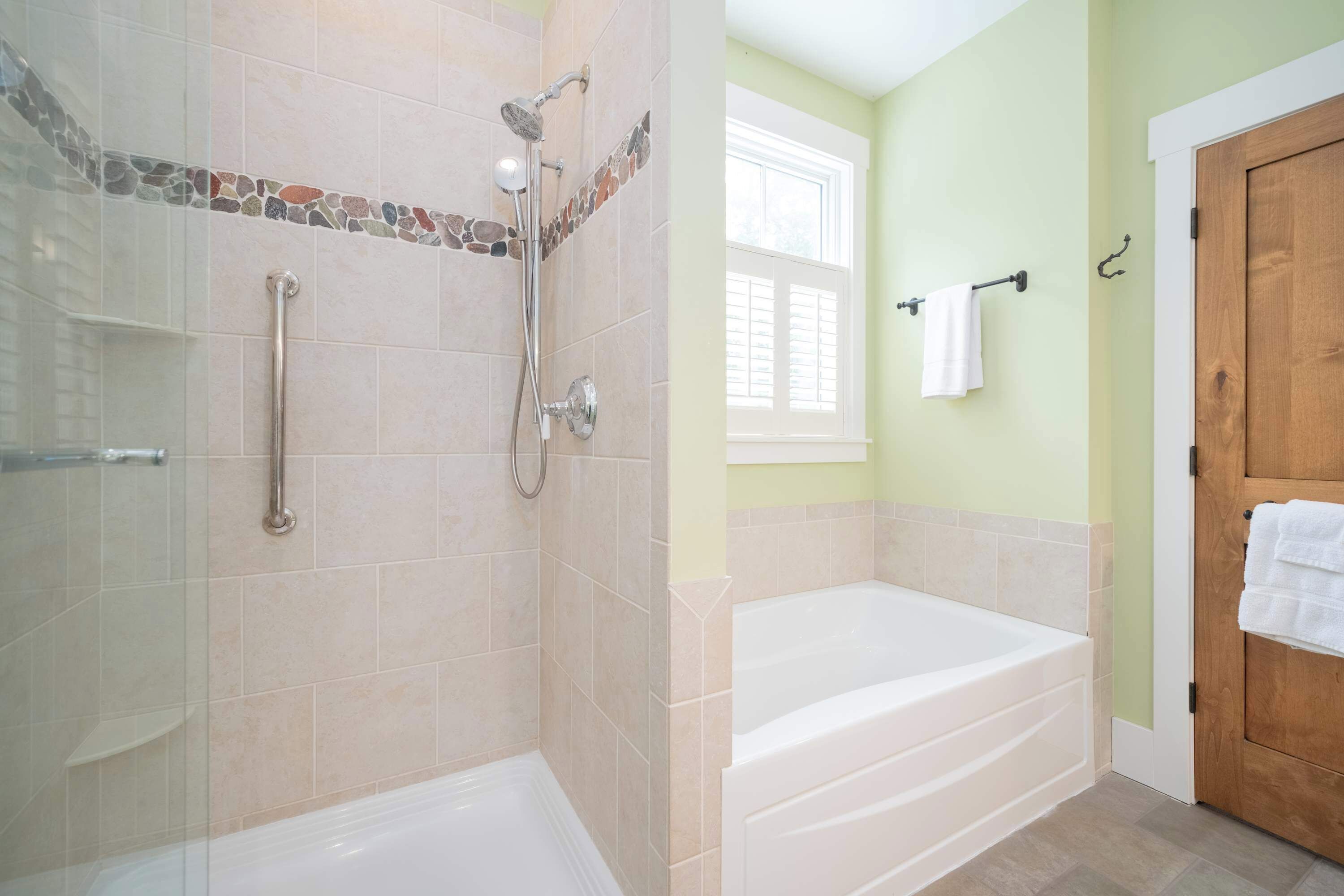 Shower, hair dryer, towels, shampoo