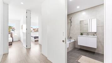 Shower, hair dryer, towels