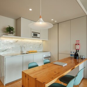 Private kitchen - Penthouse with Private Balcony | Baumhaus Serviced Apartments | Central Porto (Porto)