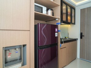 Standard Apartment | Private kitchen - Homey Studio Loft Apartment At Apple 1 Condovilla (Jakarta)
