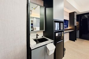 Standard Studio | Private kitchen | Electric kettle - Modern Grey Studio For 2 Pax (No Kitchen) At Atria Residence Gading Serpong (Gading Serpong)