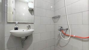 Standard Studio | Bathroom - Nice And Restful Studio At Benson Supermall Mansion Apartment (Surabaya)