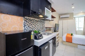 Standard Studio | Private kitchen - Comfortable Classic Studio At Apartment Cinere Bellevue Suites (Depok)