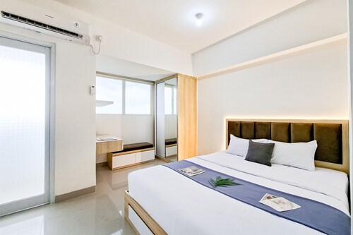 Comfy Studio With City View At Cisauk Point Apartment