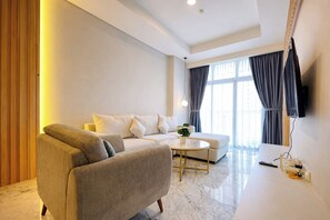 Standard Apartment | Living room - Spacious 2Br Apartment At Condomonium Podomoro City Deli Medan (Medan)