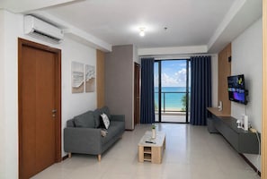 Apartamento estándar | Sala de estar | Una televisión de pantalla plana