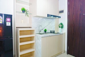 Standard Studio | Private kitchen - Relaxing Stay Studio At Apartment Lrt City Bekasi (Bekasi)