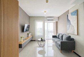 Standard Apartment | Living room - Homey And Well Designed 2Br At Nifarro Park Apartment (Jakarta)