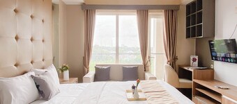 Brown Tone Studio At Oasis Cikarang Apartment