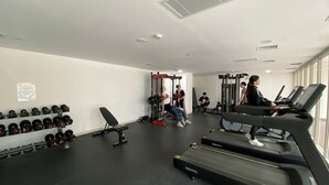 Fitness facility - Wooden Accents Studio For 2 Pax At Pacific Garden Campus Town Apartment (Tangerang)