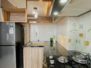 Standard Apartment | Private kitchen - Neat And Homey 2Br For 3 Pax At Podomoro Golf View Apartment (Gunung Putri)