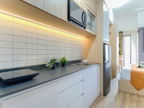 Standard Studio | Private kitchen - Modern Japandi Studio At Sayana Bekasi Apartment (Bekasi)