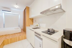 Standard Studio | Private kitchen | Electric kettle - Gorgeous And Homey Studio Sky House Alam Sutera Apartment (Tangerang)