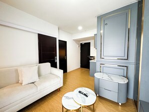 Standard Apartment | Living area - Lavish 2Br Without Kitchen At Suncity Residence (Sidoarjo)