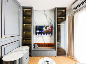 Standard Apartment | Living area - Lavish 2Br Without Kitchen At Suncity Residence (Sidoarjo)