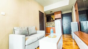 Standard Apartment | Living area - Modern 1Br With City View At Tamansari Papilio Apartment (Surabaya)