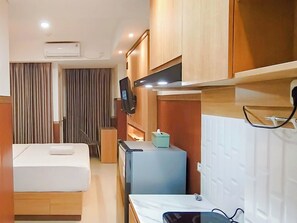 Interior - Wooden Touch Studio At Tamansari Skylounge Makassar Apartment (Makassar)