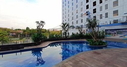 Wooden Touch Studio At Tamansari Skylounge Makassar Apartment
