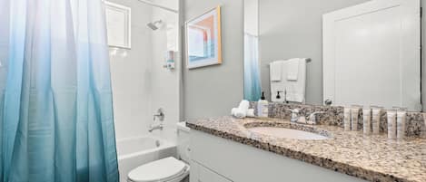 Hair dryer, towels, soap, toilet paper