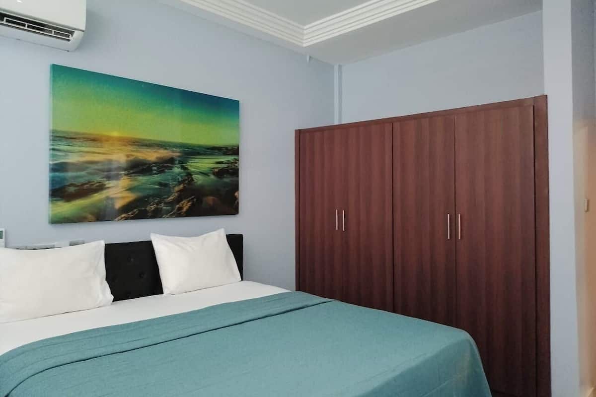 Apartment, 1 Bedroom, Balcony, City View | Premium bedding, desk, laptop workspace, blackout drapes