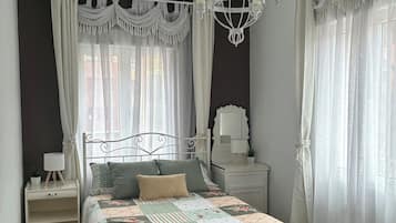 2 dormitorios, tabla de planchar con plancha, wifi gratis y ropa de cama