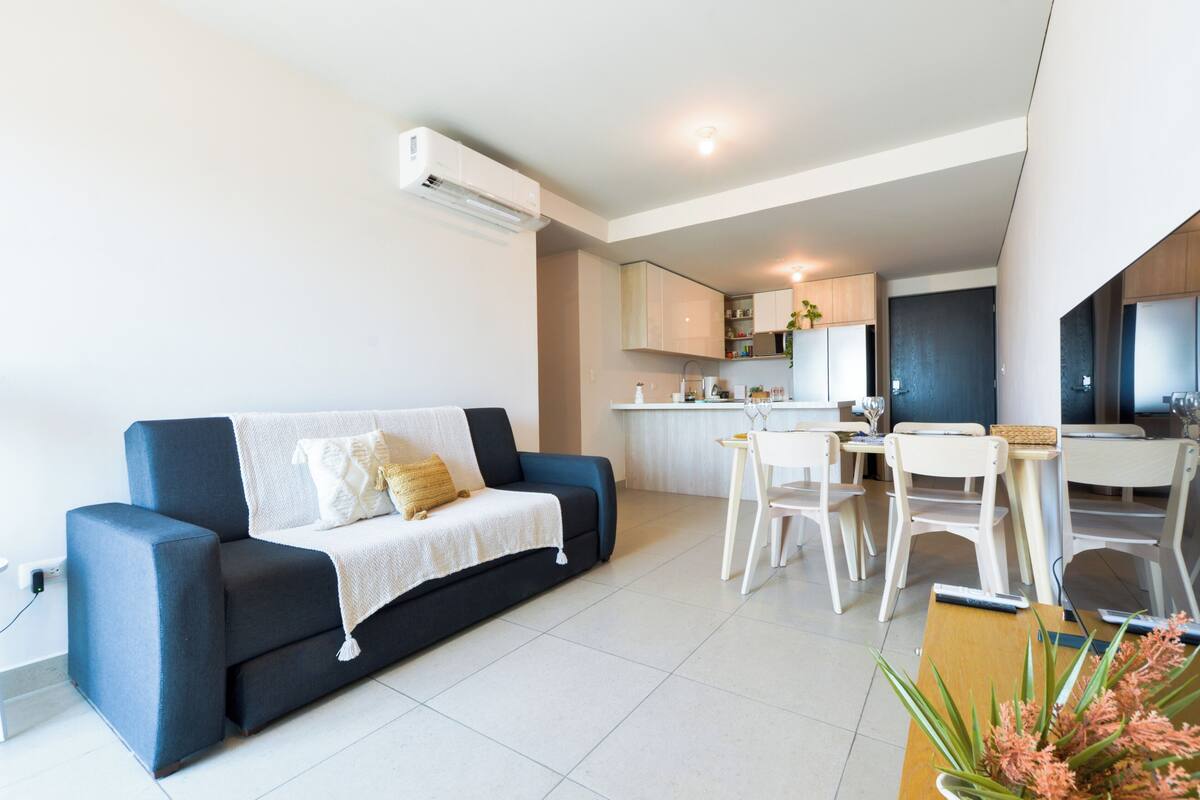 Superior Suite, Balcony, City View | Living area | 60-inch Smart TV with digital channels, streaming services