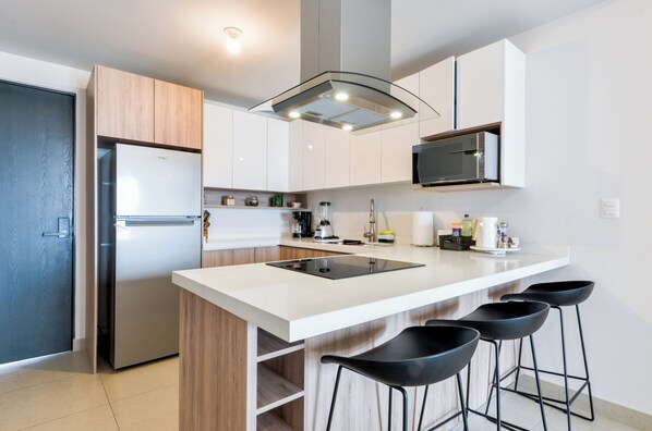 Family Suite, City View | Private kitchen