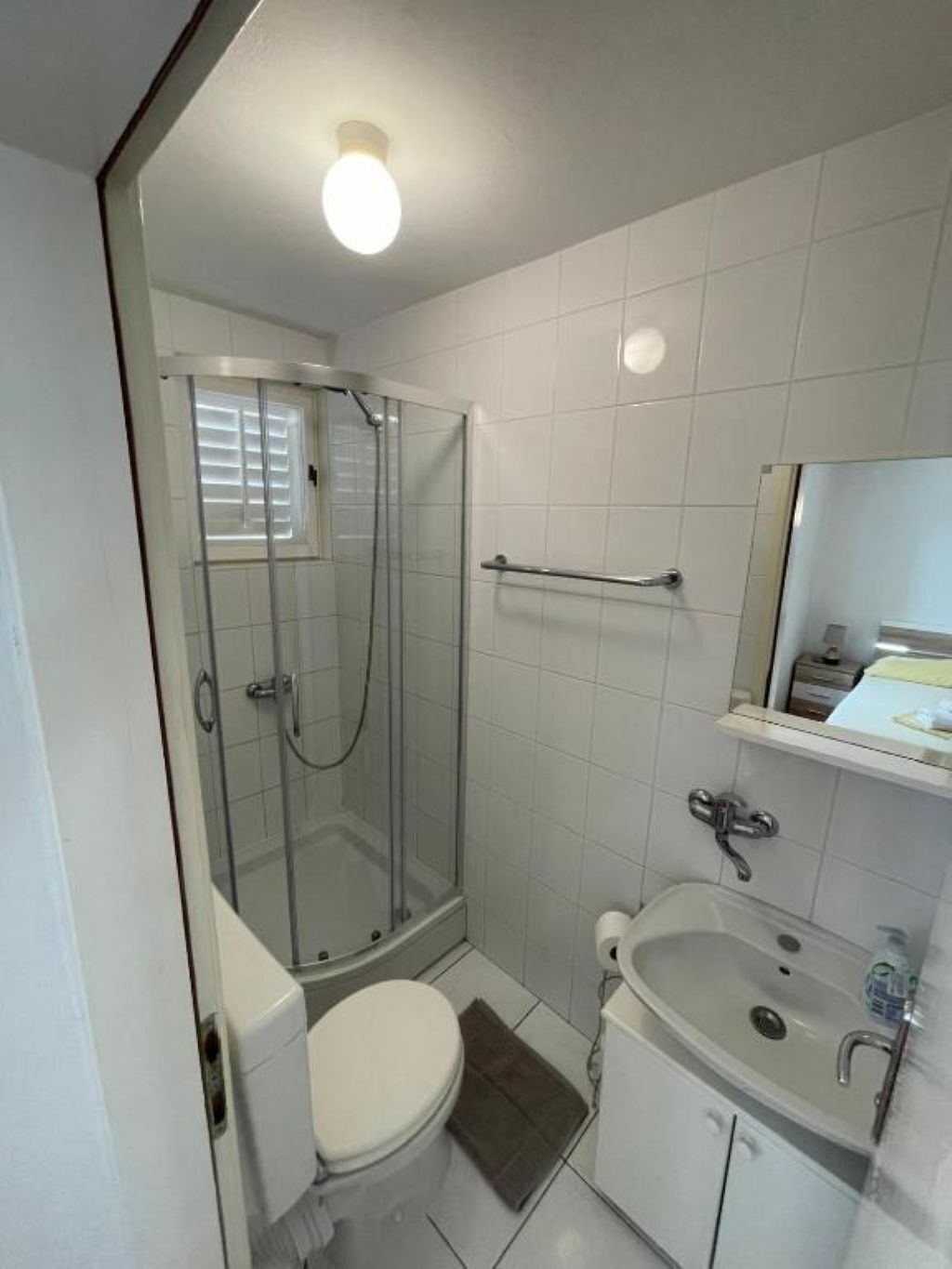 Shower, towels, soap, toilet paper