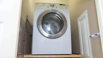 Apartment, Multiple Beds, Kitchen, Pool View (Harbor by the Sea #1) | Laundry