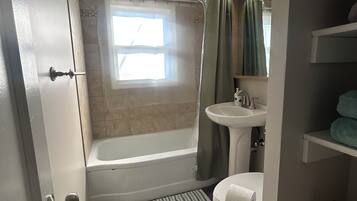 Hair dryer, towels, soap, shampoo