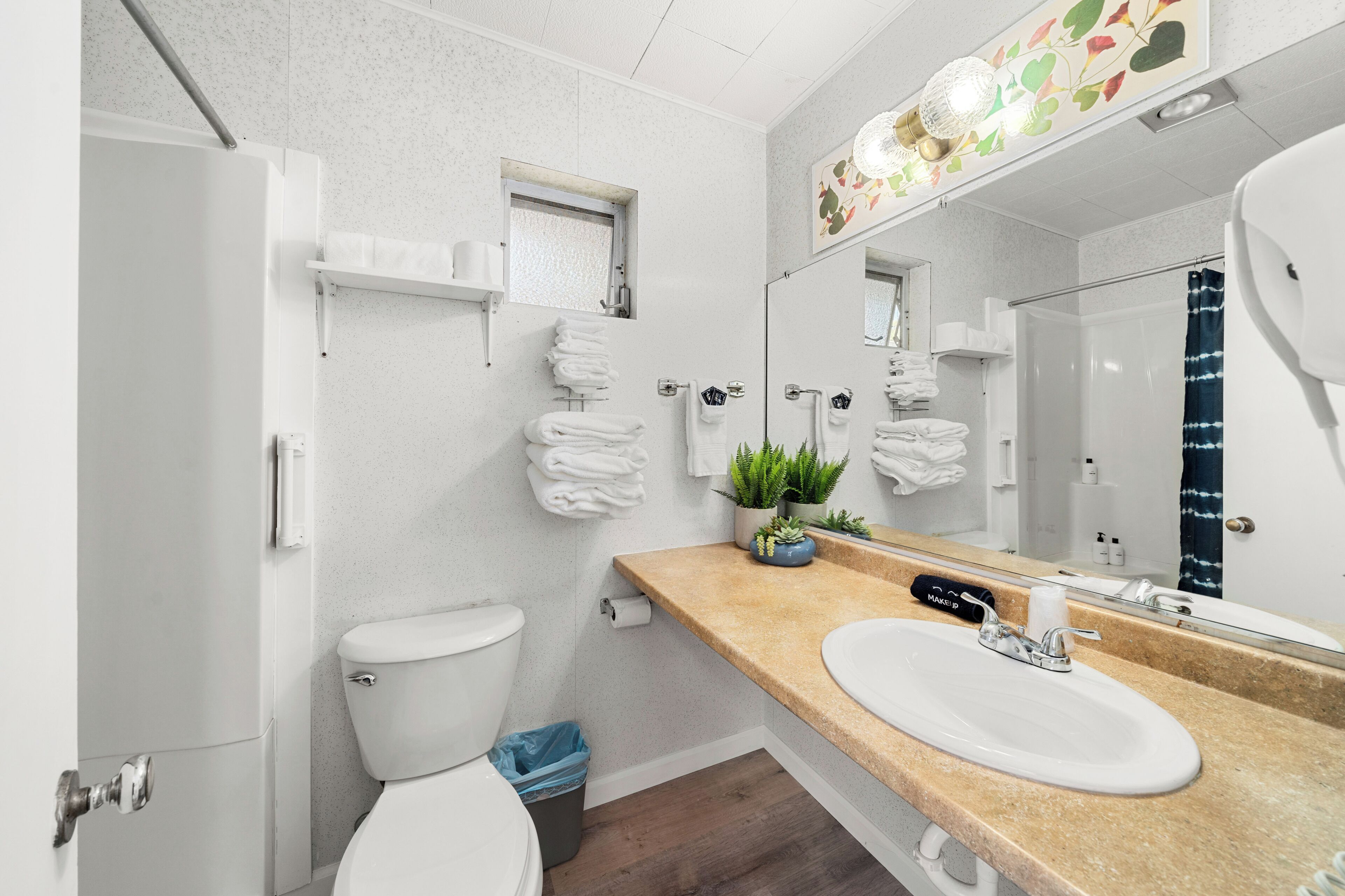 Hair dryer, towels, soap, toilet paper