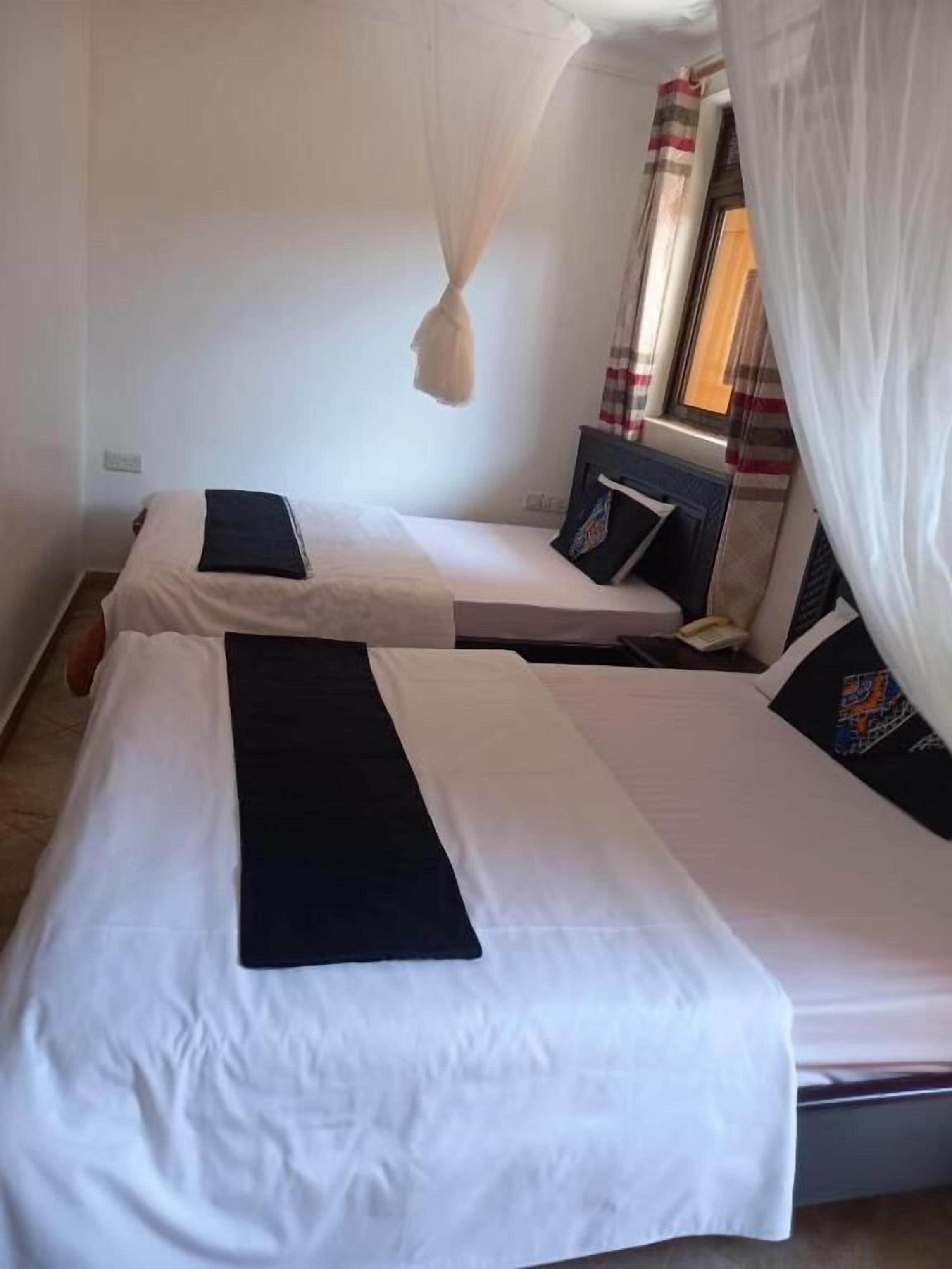 Twin Room, Balcony, Garden View | Desk, laptop workspace, free WiFi