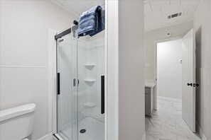 Shower, towels - Your 3 Bedroom Home Away From Home in Groves (Groves)