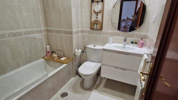 Hair dryer, bidet, towels, soap