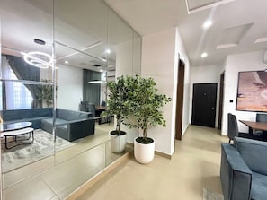Departamento Deluxe, balcón, vista a la ciudad | Interior