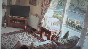 Interior - Riverside Cottage views from veranda to the river and wildlife it brings (Newton Stewart)