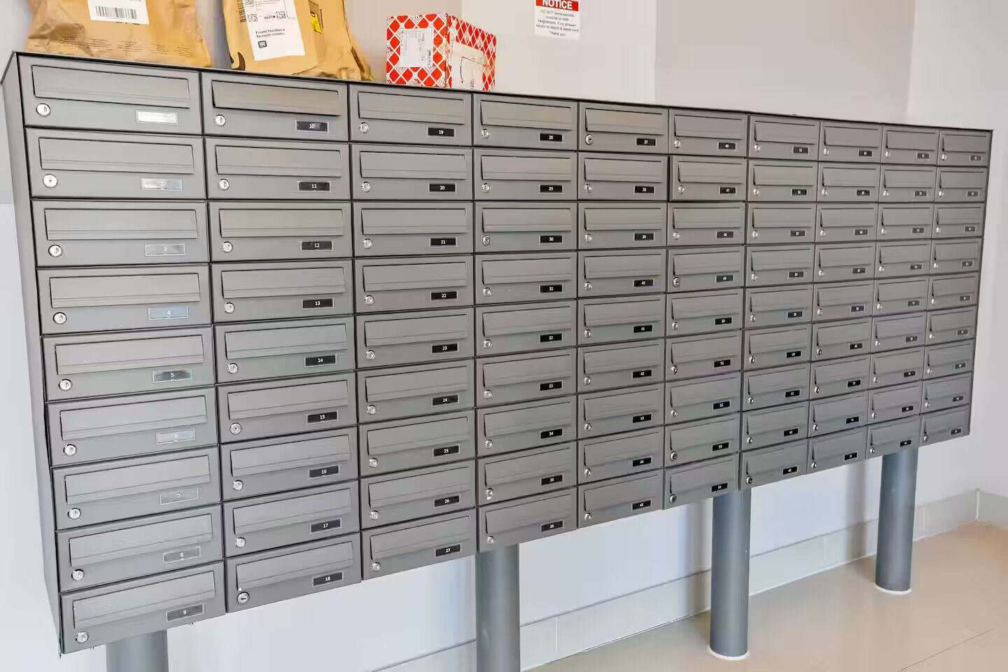 A large metal filing cabinet with multiple drawers, each labeled with numbers.