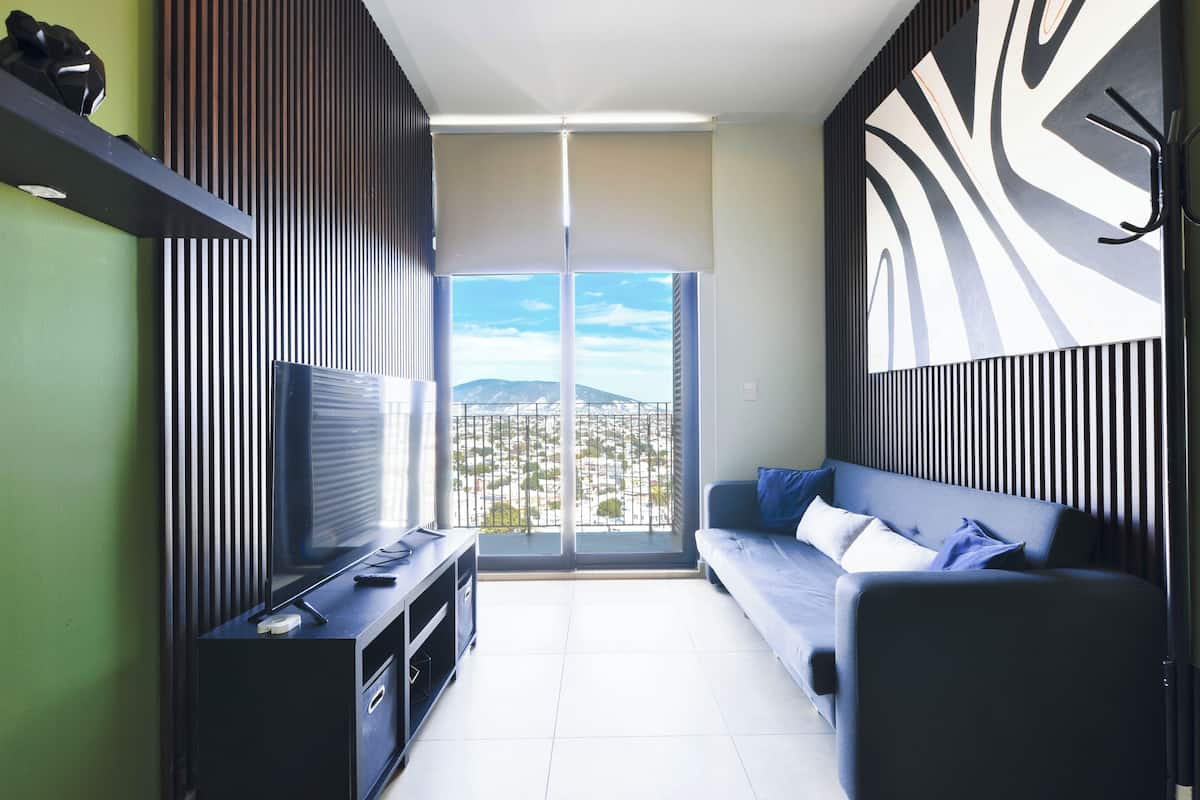 Suite Club, balcon, vue ville | Coin séjour