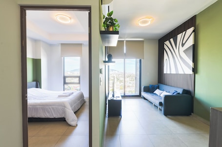 Club Suite, Balcony, City View | Living area. Amo Living