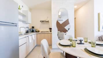 Fridge, microwave, stovetop, coffee/tea maker