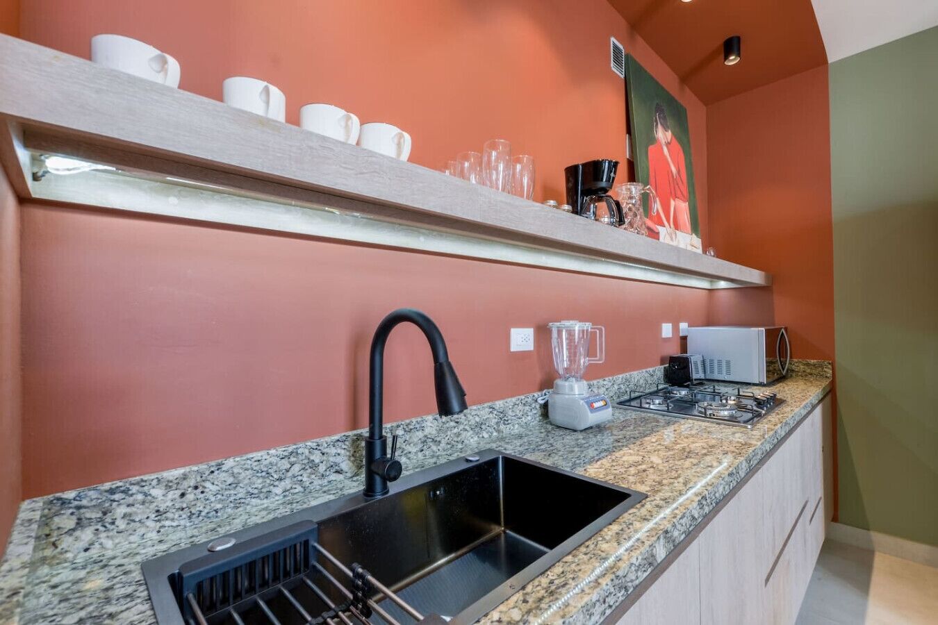 Fridge, microwave, stovetop, coffee/tea maker