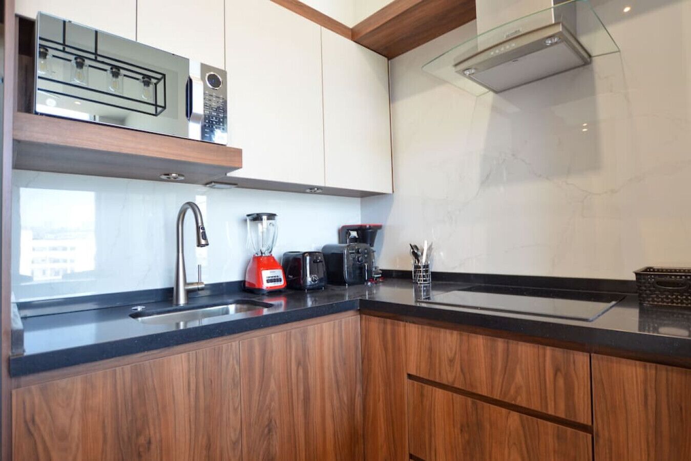 Fridge, microwave, stovetop, coffee/tea maker